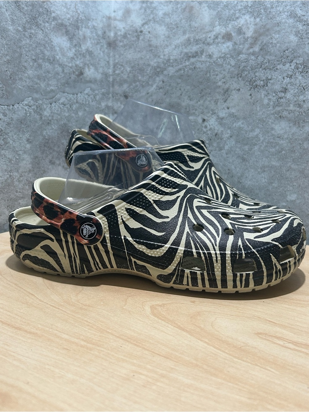 Crocs Classic Animal Remix Clogs featuring a zebra print design women’s size 9
